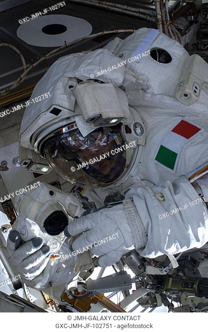 European Space Agency astronaut Luca Parmitano, Expedition 36 flight engineer, participates in a session of extravehicular activity (EVA) as work continues on...