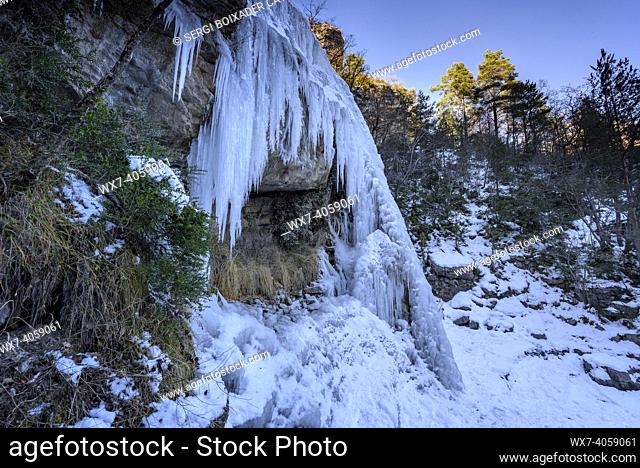 Salt de Murcurols waterfall frozen and snowy in winter (Berguedá , Catalonia, Spain, Pyrenees)