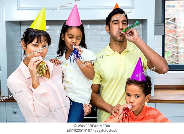 Happy family partying in the kitchen