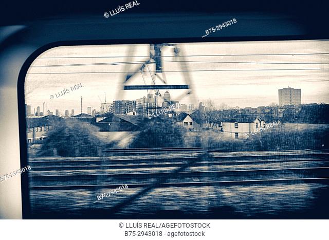 View from a moving train. Newham, East London, England