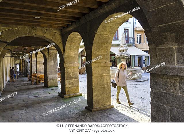 Woman at Praza do Campo square at the old town of Lugo city, Galicia, Spain, Europe