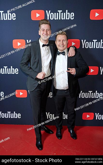 28 November 2023, Berlin: DJ Robin (l) and Schürze attend the award ceremony for YouTube Music - Germany's Musician of the Year 2023