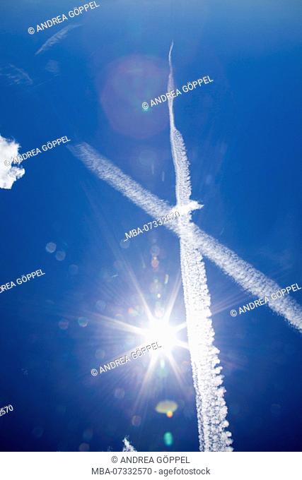 South Tyrol, Vigiljoch Mountain, view of the sky with cross-shaped contrails