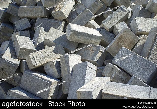 Pile of concrete cobblestones. . Improvement of the city Infrastructure