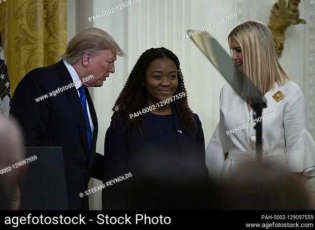 Bella Hounakey, a survivor of human trafficking, is seen with United States President Donald J. Trump and First Daughter and Advisor to the President Ivanka...