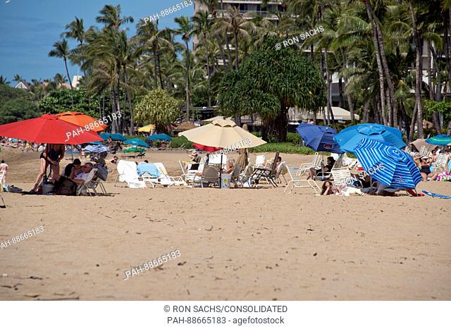 Beach umbrellas along Kaanapali Beach in Lahaina, Maui, Hawaii on Thursday, March 2, 2017. Kaanapali Beach is the home of several hotels and time shares along...
