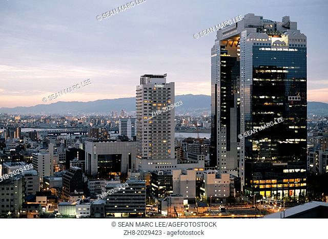 An evening view of the Umeda Sky Building, designed by Hiroshi Hara in Osaka, Japan