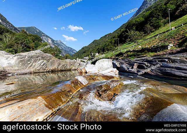 Switzerland, Ticino, Lavertezzo, Verzasca river flowing through Valle Verzasca in summer