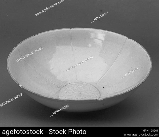 Bowl. Period: Song dynasty (960-1279); Culture: China; Medium: Porcelain (Ding ware); Dimensions: H. 3 in. (7.6 cm); Diam. 8 1/8 in. (20