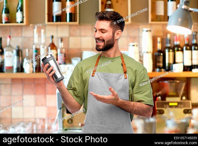 happy waiter with tumbler or takeaway thermo cup