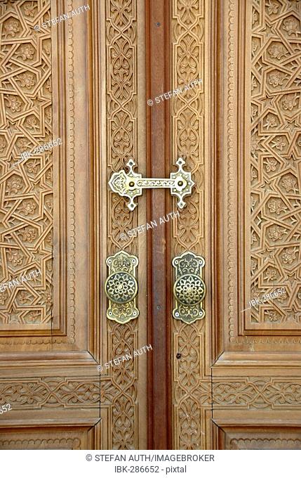 Fine carved wooden entrance door with brass lock museum of Madrasah Barak Chan Madrasah Barak Chan Tashkent Uzbekistan