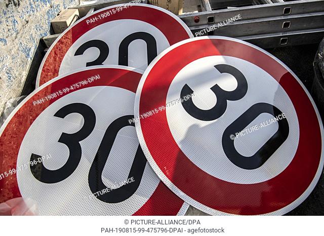 15 August 2019, Berlin: New Speed 30 signs are on a truck on Sonnenallee in Neukölln. As things stand at present, new diesel driving bans are expected to be...