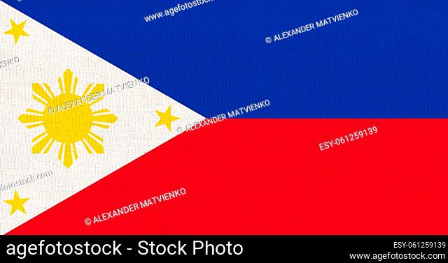 Philippines national fabric flag textile background. Symbol of Asian country. State official Philippines sign. Republic of the Philippines