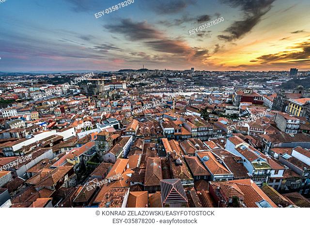 Sunset over Porto and Vila Nova de Gaia, Portugal. View from bell tower of Clerigos Church with Se Cathedral