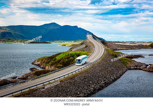 Tourist bus traveling on the road in Norway. Atlantic Ocean Road or the Atlantic Road (Atlanterhavsveien) been awarded the title as
