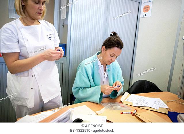 Photo essay at Nice university hospital, Archet hospital about bone marrow donation, France. Labelling of the specimens of the sample of bone marrow