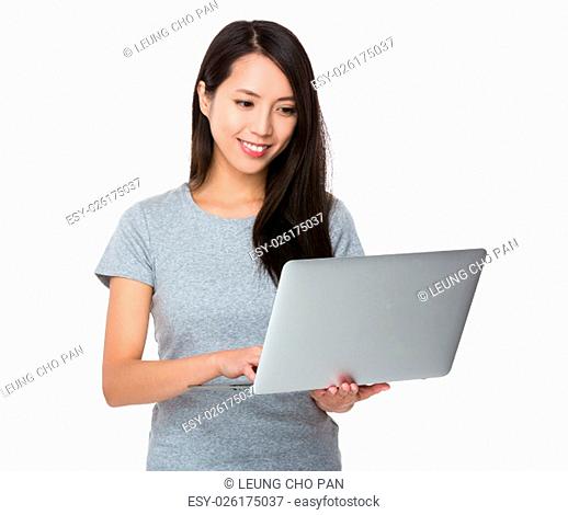 Woman working with the notebook computer