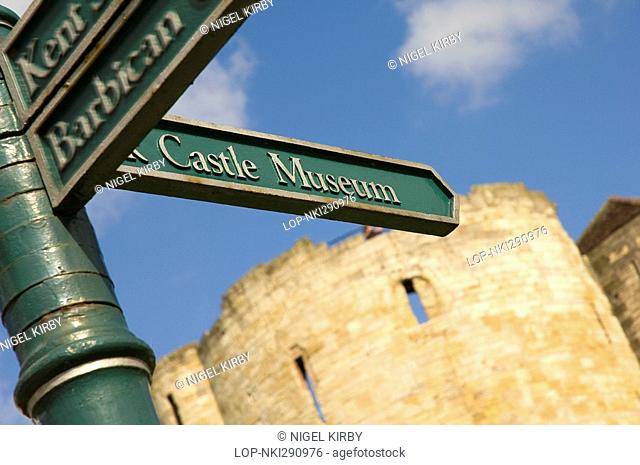 England, North Yorkshire, York, City of York tourist direction signpost outside Cliffords Tower directing tourists to the Castle Museum