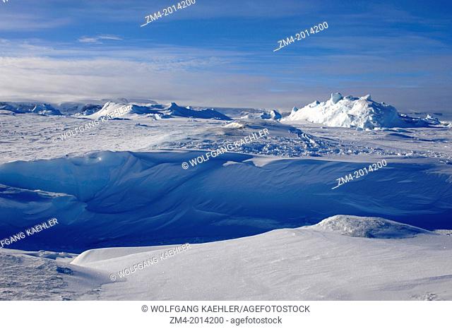ANTARCTICA, WEDDELL SEA, SNOW HILL ISLAND, ICEBERGS FROZEN IN FAST ICE