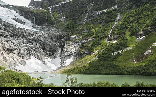 Jostedalsbreen National Park, Sogn Og Fjordane County, Norway. Boyabreen Glacier In Spring Sunny Day. Famous Norwegian Landmark And Popular Destination
