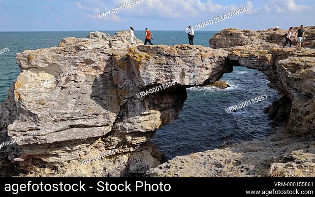 Rock arch on cliffs in Tyulenovo village, ont Black Sea shore in Bulgaria, 4k video
