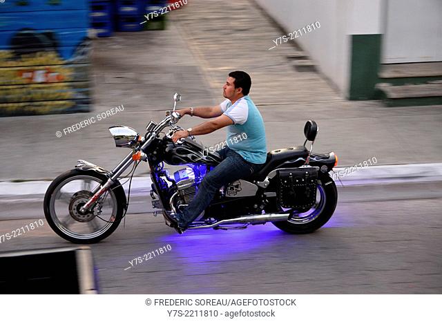 Harley Davidson biker in Flores, Guatemala, Central America