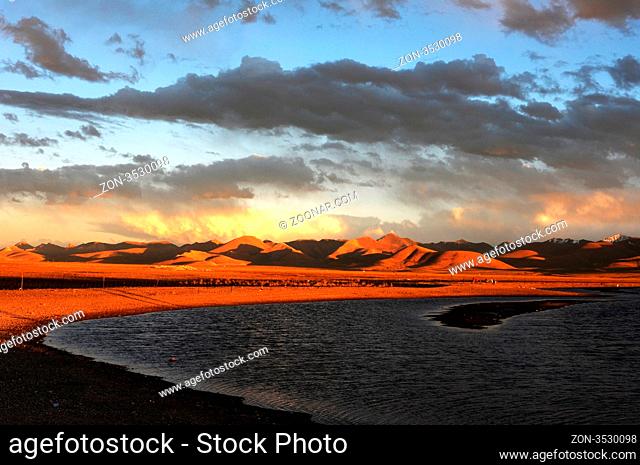 Landscape at lakeside in the highlands of Tibet at sunset