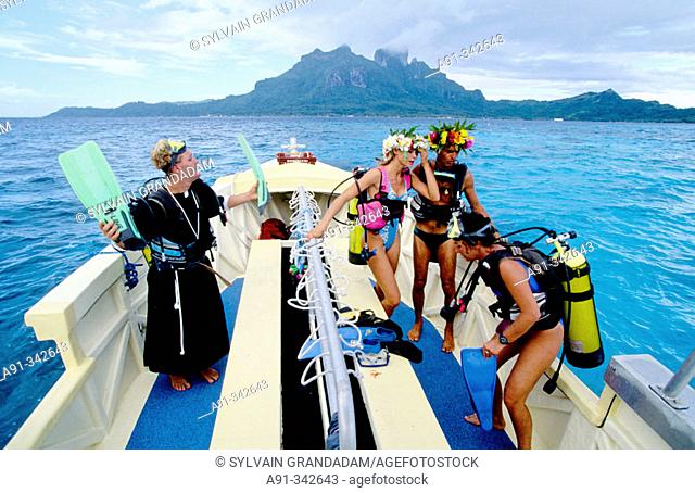Funny undermarine wedding to be celebrated for professional divers. Bora Bora. Leeward islands. Society archipelago. French Polynesia