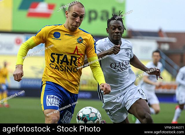 Waasland-Beveren's Michael Frey and Eupen's Amara Baby fight for the ball during a soccer match between Waasland-Beveren and KAS Eupen