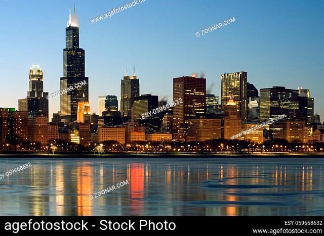 Downtown Chicago reflected in frozen Lake Michigan