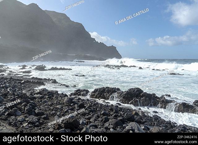 Foam waves on the rocky coast of Buenavista North of Tenerife island Spain
