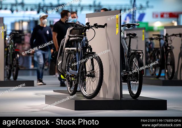 11 September 2021, Bavaria, Munich: Various bikes are on display at the Kettler stand during the International Motor Show (IAA Mobility)