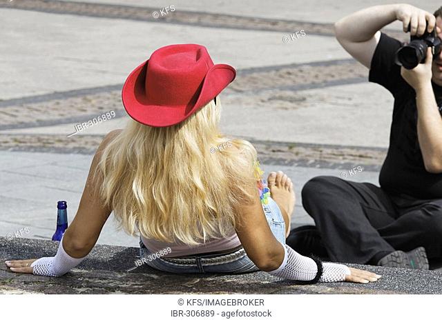 Picture taken of a blond girl with red hat, Loveparade 2007, Essen, NRW, Germany