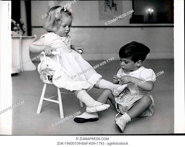1968 - The Little Gentleman: James Henderson assists fellow 2 1/2 year old dance student Jessica Nasmyth with her ballet shoe before their class commences
