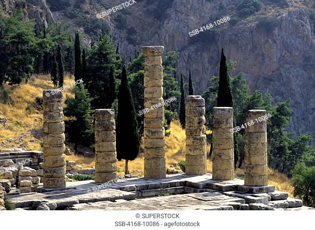 Greece, Delphi, Sanctuary Of Apollo, Temple Of Apollo, Cypress And Pine Trees