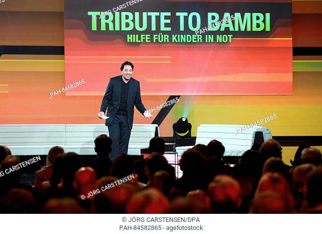 Presenter Cherno Jobatey on stage at the charity event Tribute to Bambi in Berlin, Germany, 6 October 2016. Photo: Joerg Carstensen/dpa | usage worldwide
