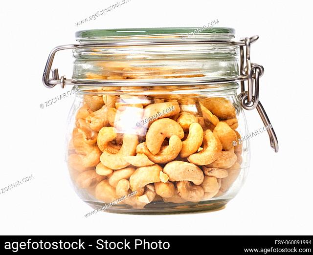 Cashews in a jar, isolated white background