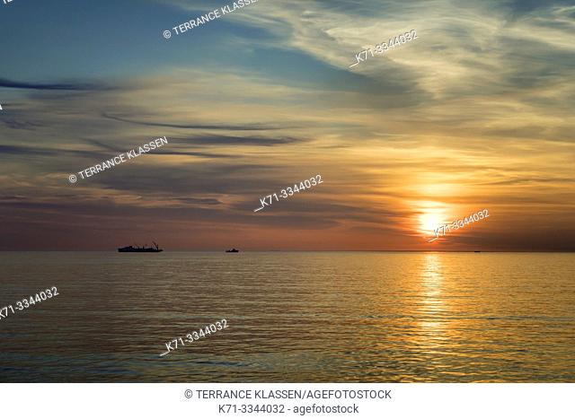 The ship Castarone, an oil pipe laying vessel in the North Atlantic at sunset