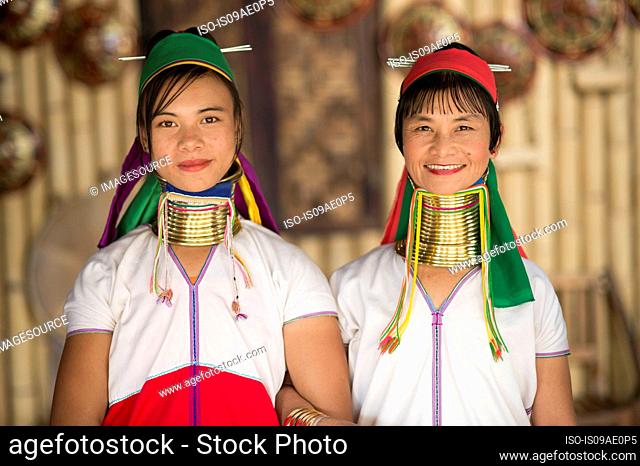 Portrait of two women in traditional clothing, Inle lake, Burma