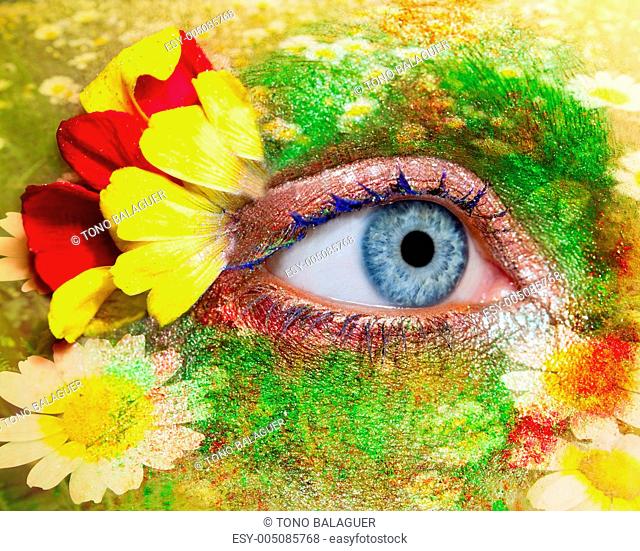 blue woman eye makeup spring flowers metaphor