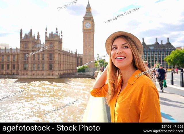 Smiling female tourist visiting London sights, United Kingdom