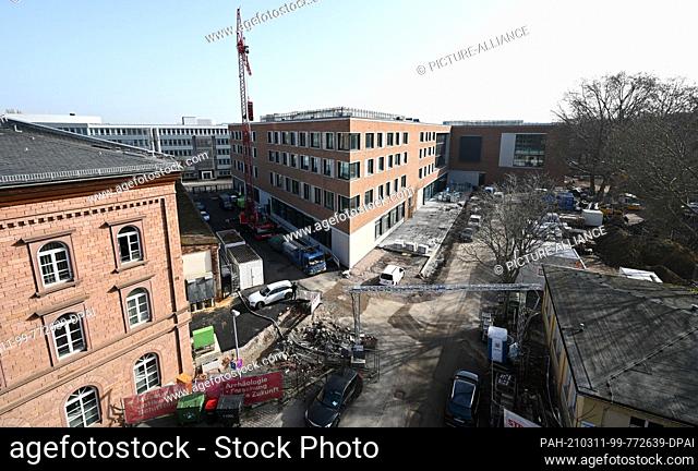 24 February 2021, Rhineland-Palatinate, Mainz: Construction work is in full swing on the new building for the Roman-Germanic Central Museum (RGZM) and the...