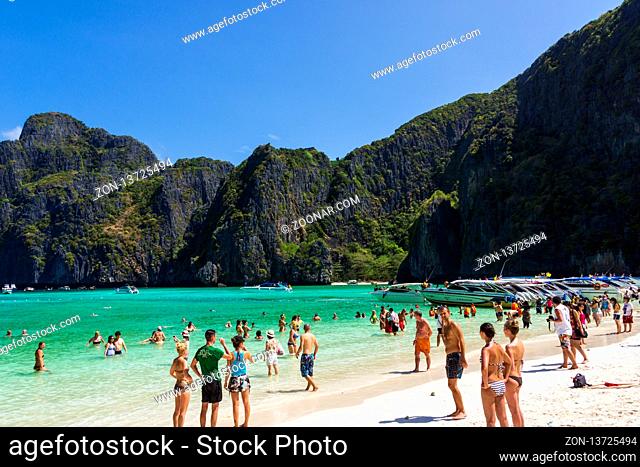 Phi Phi Lay island, Thailand, March 2013 Crowds of tourists enjoying a trip to Maya Bay, one of the iconic beaches of Phi Phi islands