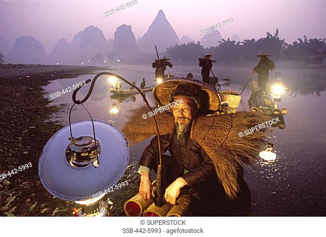 Cormorant Fisherman on Bamboo Rafts, Li River, Guilin, Yangshou, Guangxi Province, China