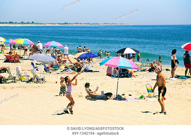 Sunbathers on Surfside Beach on the seaward coast of the island of Nantucket, Massachusetts, New England, USA
