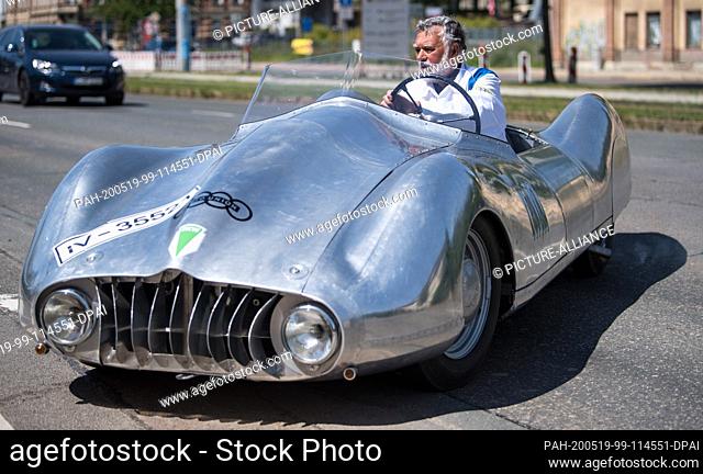 19 May 2020, Saxony, Chemnitz: Frieder Bach, collector and restorer of vintage cars, drives the last and brand new DKW F9 sports car in Chemnitz
