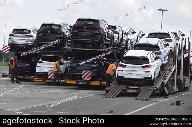 Employees of the Hyundai's Czech plant load new models of the Hyundai i30 onto a truck semi-trailer in Nosovice, Czech Republic, June 23, 2020