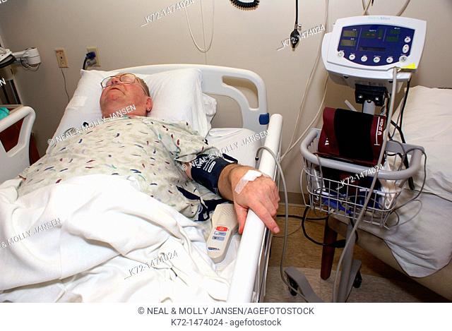 Patient recovering in hospital bed