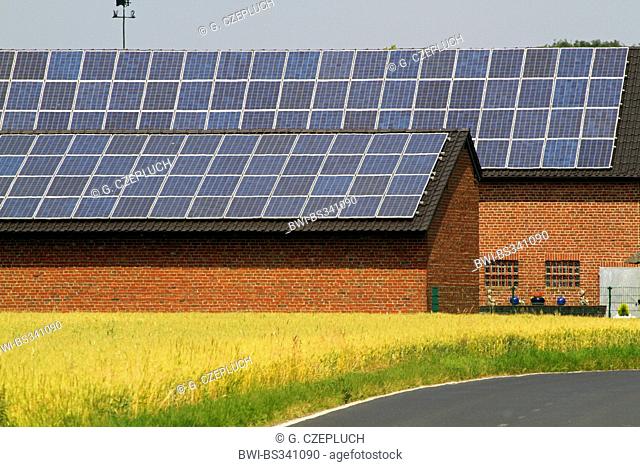 solar panels on the roof of a farmhouse