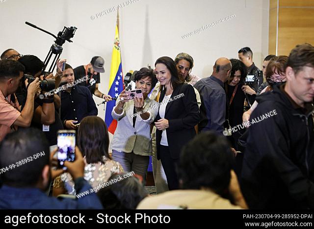 04 July 2023, Venezuela, Caracas: Maria Corina Machado (m., r), opposition politician and leader of the Vente Venezuela party
